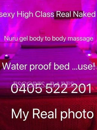 Image of Singapore babe Monica nuru massage in waterproof bed Busty